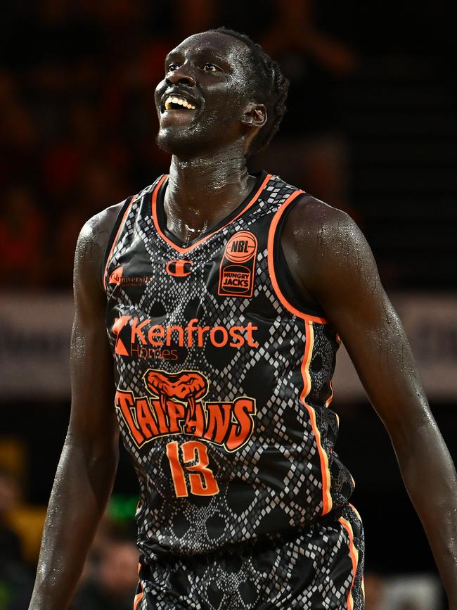 CAIRNS, AUSTRALIA - JANUARY 13: Akoldah Gak of the Taipans reacts during the round 15 NBL match between Cairns Taipans and Adelaide 36ers at Cairns Convention Centre, on January 13, 2024, in Cairns, Australia. (Photo by Emily Barker/Getty Images)