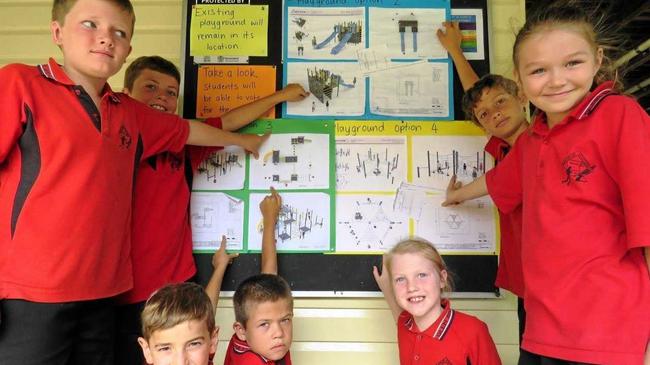 WHICH IS BEST? Glen Aplin students take a vote on their new playground design. Picture: Contributed