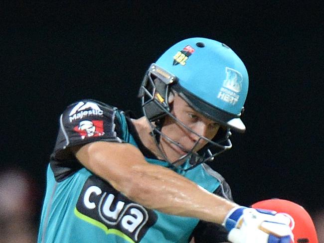 BRISBANE, AUSTRALIA - JANUARY 20:  Sam Heazlett of the Heat hits the ball over the boundary for a six during the Big Bash League match between the Brisbane Heat and the Melbourne Renegades at The Gabba on January 20, 2017 in Brisbane, Australia.  (Photo by Bradley Kanaris/Getty Images)