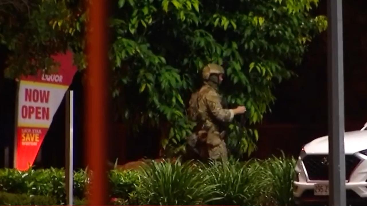 One person was dressed in military fatigues at the scene. Picture: 7 News