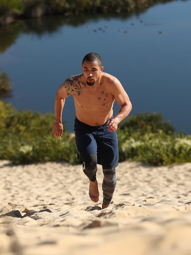 Whittaker running the Wanda sand dunes. Picture: Brett Costello