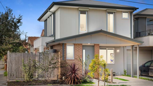 The two-bedroom townhouse at 1A Hughes St, Yarraville is listed with $650,000-$715,000 price hopes.