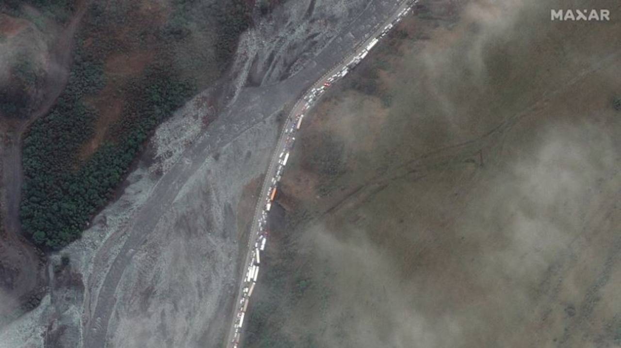 Russia’s mass exodus has been captured from the sky, with new satellite images showing hundreds of cars in gridlock making a beeline for the border. (Source: Maxar)