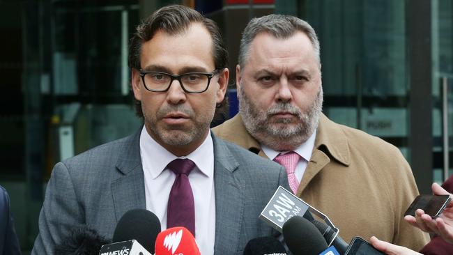 Israel Folau’s solicitor, George Faros, left, and barrister Stuart Wood QC outside the Federal Circuit Court in Melbourne yesterday. Picture: AAP