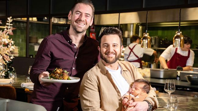 Callum Hann and Themis Chryssidis with newborn baby Leni. The duo are taking over Sashi Cheliah’s old Pirie St restaurant, which will now have a Mediterranean, Morrocan and Middle Eastern cuisine. Picture: The Advertiser/ Morgan Sette