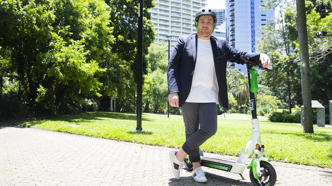 Lime Asia Pacific government relations head Mitchell Price with the company’s latest e-scooter model. Picture: Lachie Millard