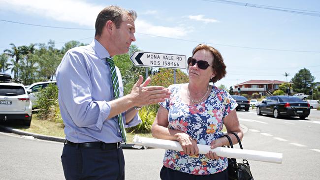 Rob Stokes with local resident Julie Hansor at the new suburb which will be redeveloped. Adam Yip/ The Manly Daily