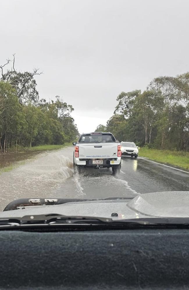 The Hervey Bay Maryborough Rd was affected by flash flooding on Monday by heavy rain. Picture: Kathy Nielsen, Facebook.