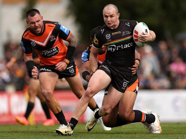 BATHURST, AUSTRALIA - APRIL 20:  Dylan Edwards of the Panthers is tackled during the round seven NRL match between Penrith Panthers and Wests Tigers at Carrington Park on April 20, 2024, in Bathurst, Australia. (Photo by Cameron Spencer/Getty Images)