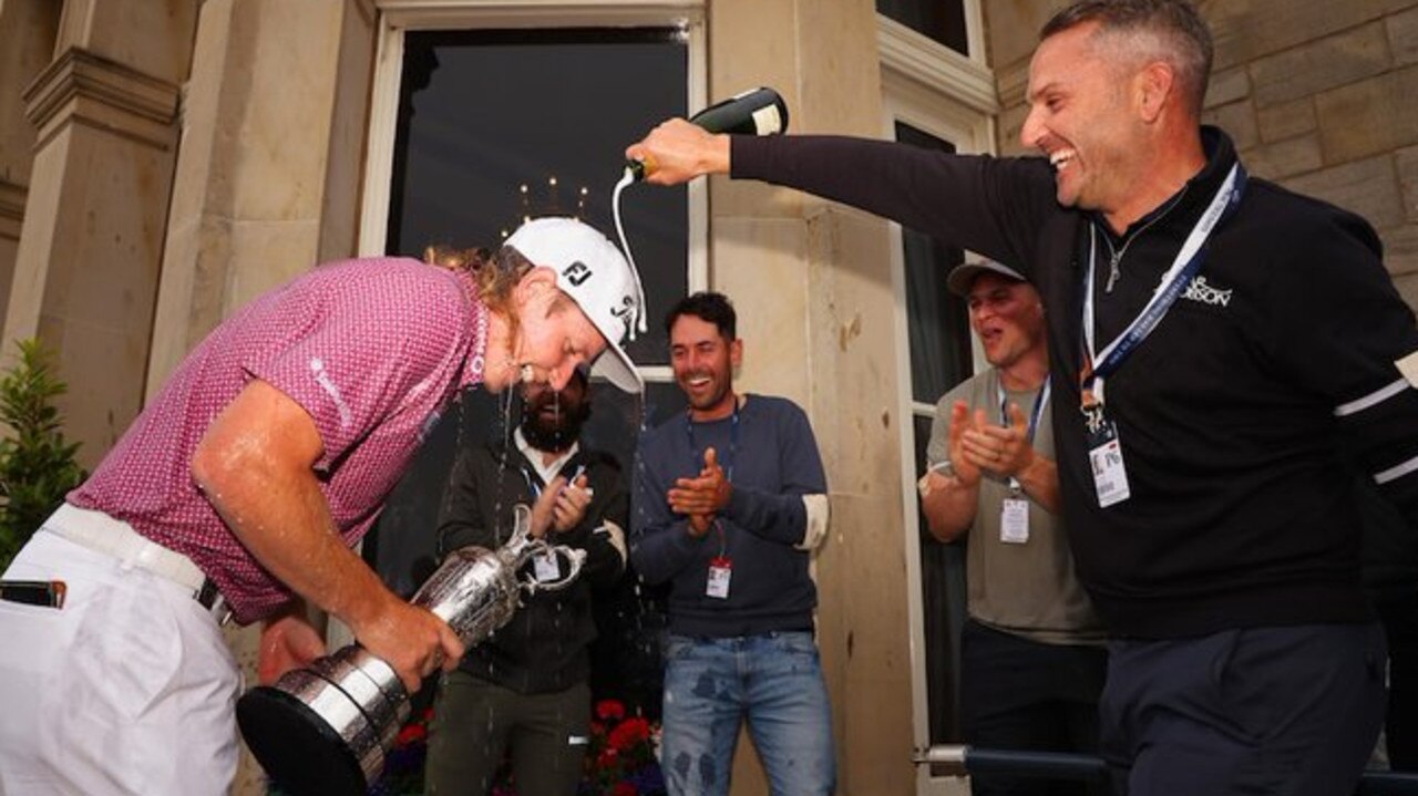 Cameron Smith is drenched in alcohol after claiming the 150th Open Championship at St Andrews. Photo: Twitter