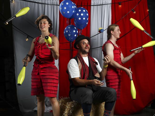 Adelaide Bite pitcher Max Beatty with Cirkidz performers Courtney Sturm, 17, and Casper Shepard, 17. Picture: Sarah Reed
