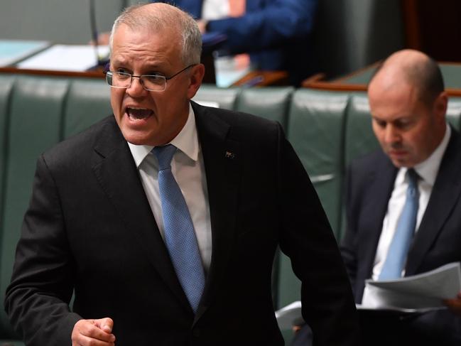 CANBERRA, AUSTRALIA - MARCH 16: Prime Minister Scott Morrison speaks during Question Time in the House of Representatives at Parliament House on March 16, 2021 in Canberra, Australia.  (Photo by Sam Mooy/Getty Images)