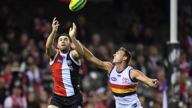 Paddy McCartin attempts to mark in front of Daniel Talia.