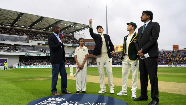 England captain Joe Root tosses the coin alongside Australia captain Tim Paine. Picture: Getty Images