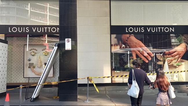 MELBOURNE, AUSTRALIA - NewsWire Photos MARCH 23, 2025: Damage has been covered up after the Louis Vuitton store at Crown Casino was ram raided early this morning. Picture: NewsWire / Andrew Henshaw