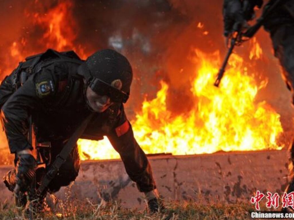 Military police undergo intensive training. In the near future, China could be ‘engineering’ babies to suit specific roles. Picture: ChinaNews