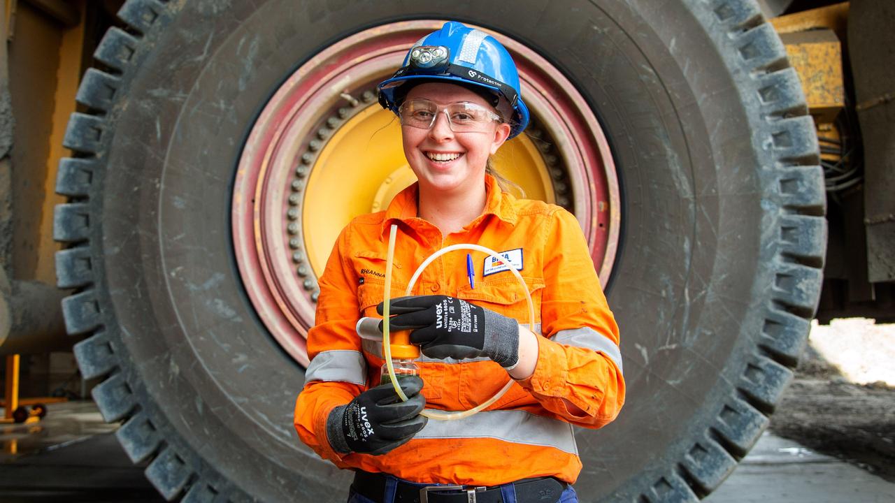 Blackwater Coal Mine, 29 Sep 20, BHP is pledging to create 3500 new trainees and apprenticesover the next five years. Apprentice Rhianna Whouley checking fluid quality on a Mine truck wheel. PIC: Daryl Wright
