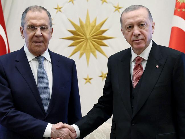 Russian Foreign Minister Sergey Lavrov (L) and Turkish President Recep Tayyip Erdogan (R) at the Presidential Complex, in Ankara. Picture: Turkish Presidential Press Office / AFP.