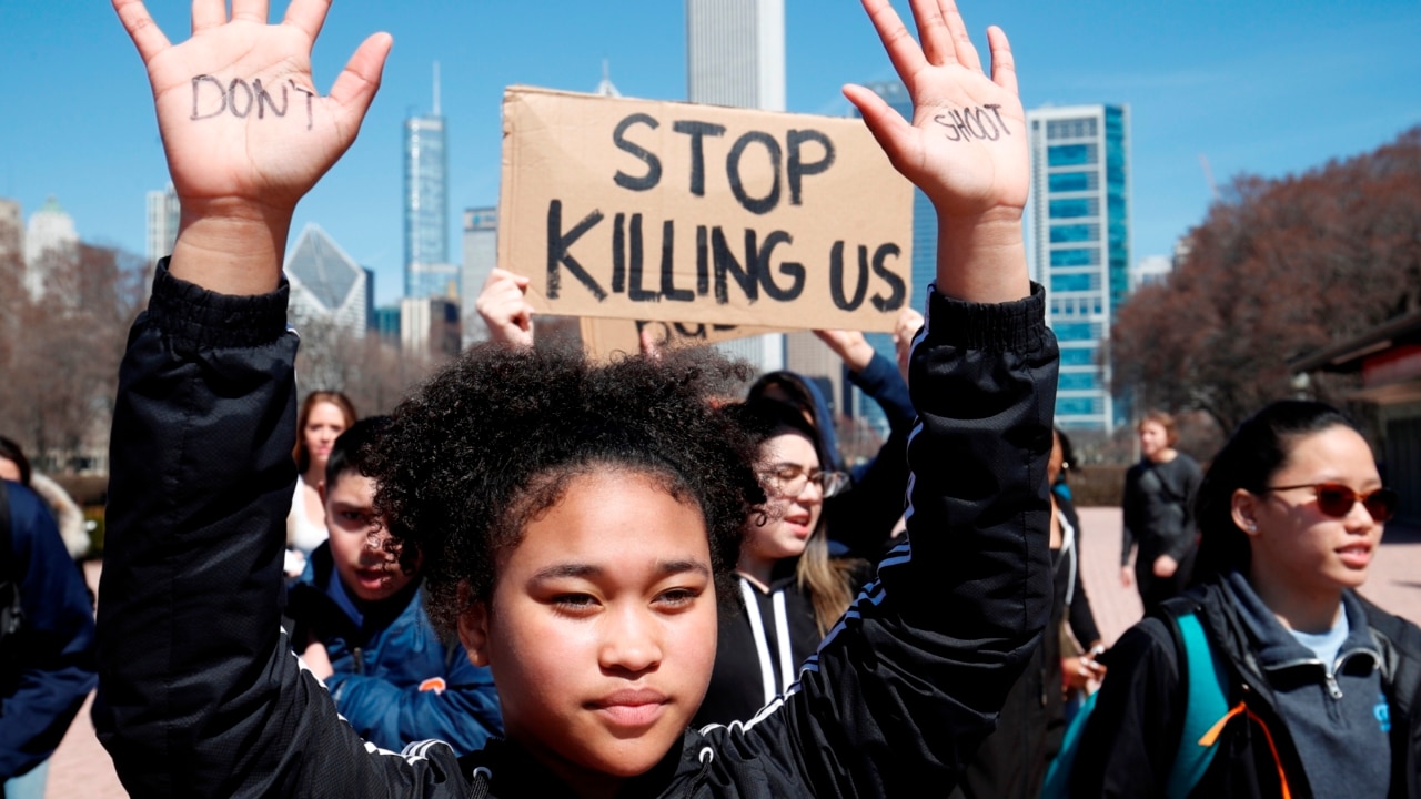 Thousands of students march for tougher gun control measures in the US