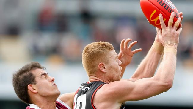 Peter Wright takes a strong mark. The key forward finished the game with five goals. Picture: Russell Freeman/AFL Photos via Getty Images