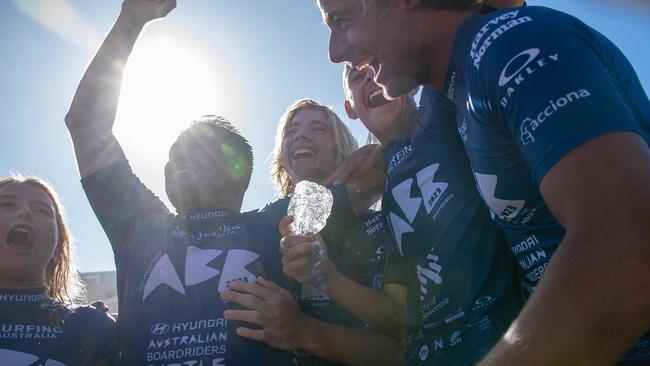 The Byron Bay Boardriders Club team of Manon Pouget, Danny Wills, Duke Wrencher, Dakoda Walters and Soli Bailey celebrate after winning the 2023 Australian Boardriders Battle. Photo: @ethdogsmith / Surfing Australia