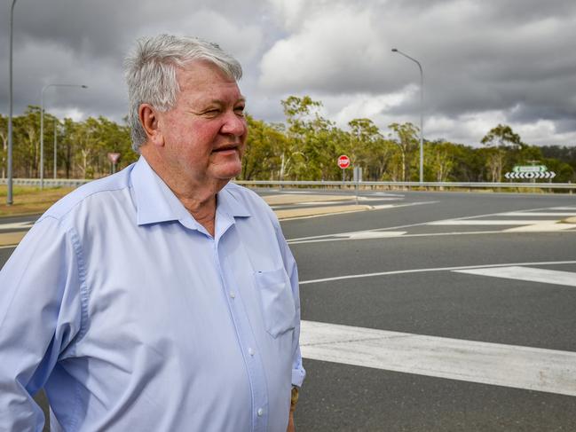 Flynn MP Ken ODowd at the intersection of Kirkwood Road and Dixon Drive in Gladstone. The intersection will have traffic lights installed thanks to federal government black spot funding.