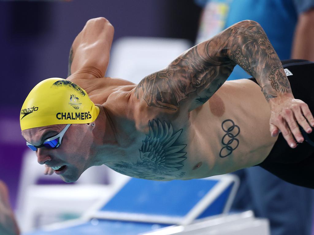 BKyle Chalmers flies off the blocks in the 100m freestyle heats. Picture: Michael Klein