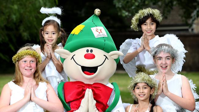 Mitcham Council’s Carols by the Creek 2015 celebration. Pictured with Jolly the elf are (clockwise from left) Louisa, Scarlett, Zac, Charlotte and Maddy. Picture Dylan Coker