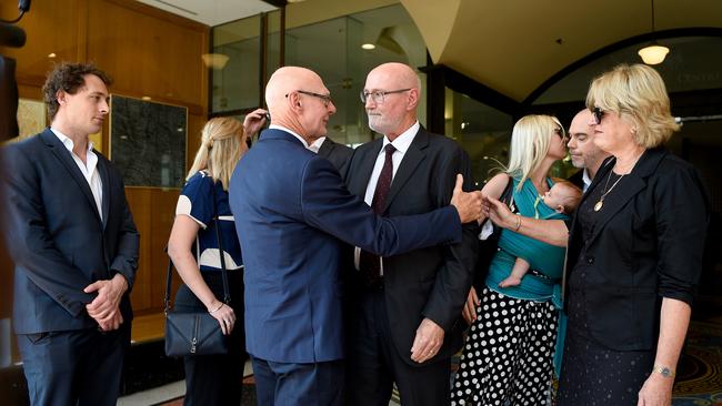 Family and friends of Annabelle Deall comfort each other outside the court (AAP Image/Bianca De Marchi) NO ARCHIVING