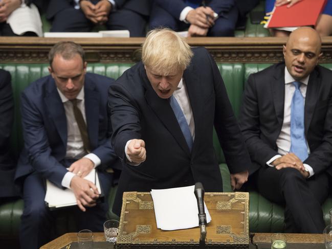 In this image released by the House of Commons, new British Prime Minister Boris Johnson gestures as he speaks in Parliament in London, Thursday, July 25, 2019. (Jessica Taylor/House of Commons via AP)