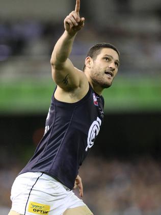 Brendan Fevola playing for Carlton.