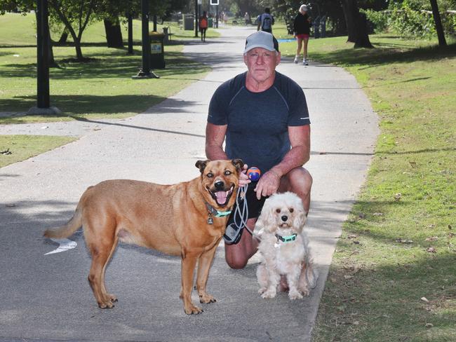 Brian on the Pratten Park footpath with his dogs Ted and Jimmy. Picture: Glenn Hampson
