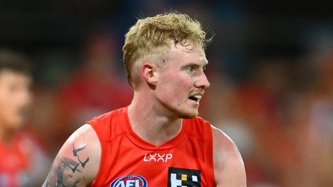 GOLD COAST, AUSTRALIA - FEBRUARY 28: John Noble of the Suns looks to kick during the 2025 AAMI AFL Community Series match between Gold Coast Suns and Sydney Swans at People First Stadium on February 28, 2025 in Gold Coast, Australia. (Photo by Matt Roberts/AFL Photos/via Getty Images)