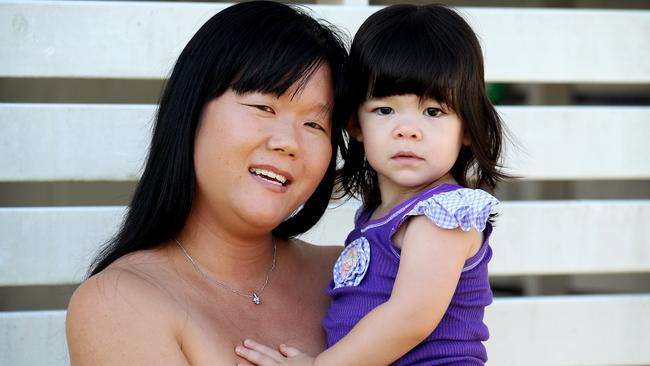 Pippa Taylor with her daughter, Lilli, who was sledged by trolls. Picture: Jeff Camden 