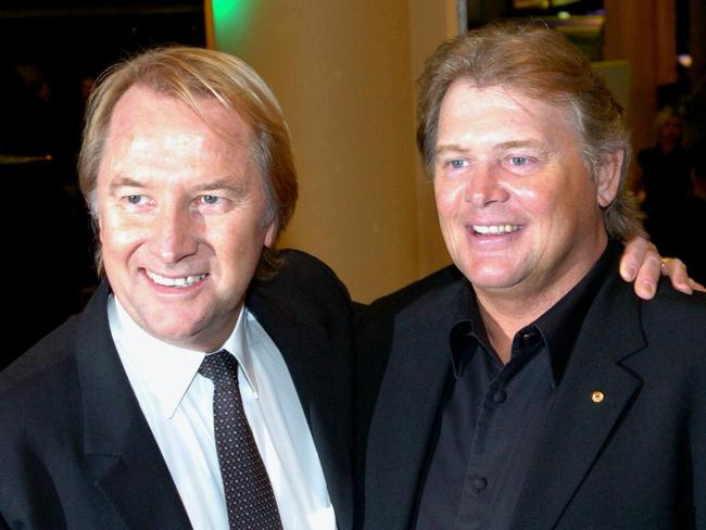 Glenn Wheatley and John Farnham in 2004.