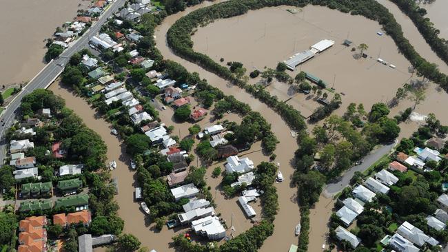 The swollen Brisbane River inundates the inner city suburb of East Brisbane. Picture: AAP Image/Dave Hunt