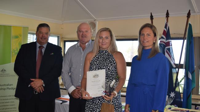Whitsunday Mayor Andrew Willcox, councillor Gary Simpson, new Australian citizen Hannah Griffiths and councillor Michelle Wright at the Australia Day Citizenship Ceremony in Bowen. Photo: Elyse Wurm