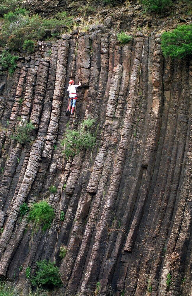 A member of the Latrobe University Abseiling club at the Organ Pipes National Park.