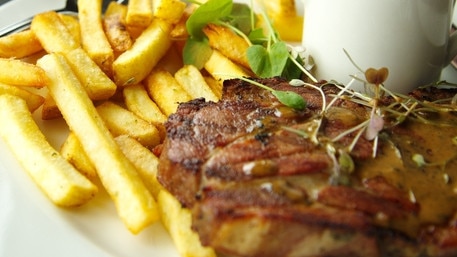 RendezView. Beef steak with french fried in white plate on table in restaurant. (Pic: iStock)