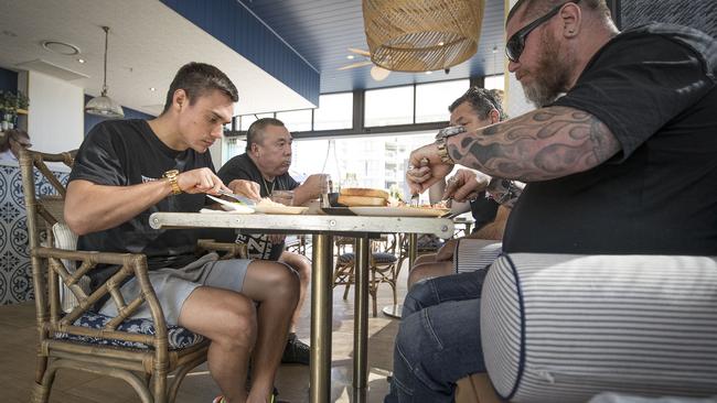 Tim Tzsyu having breakfast with is team. Picture: Peter Wallis