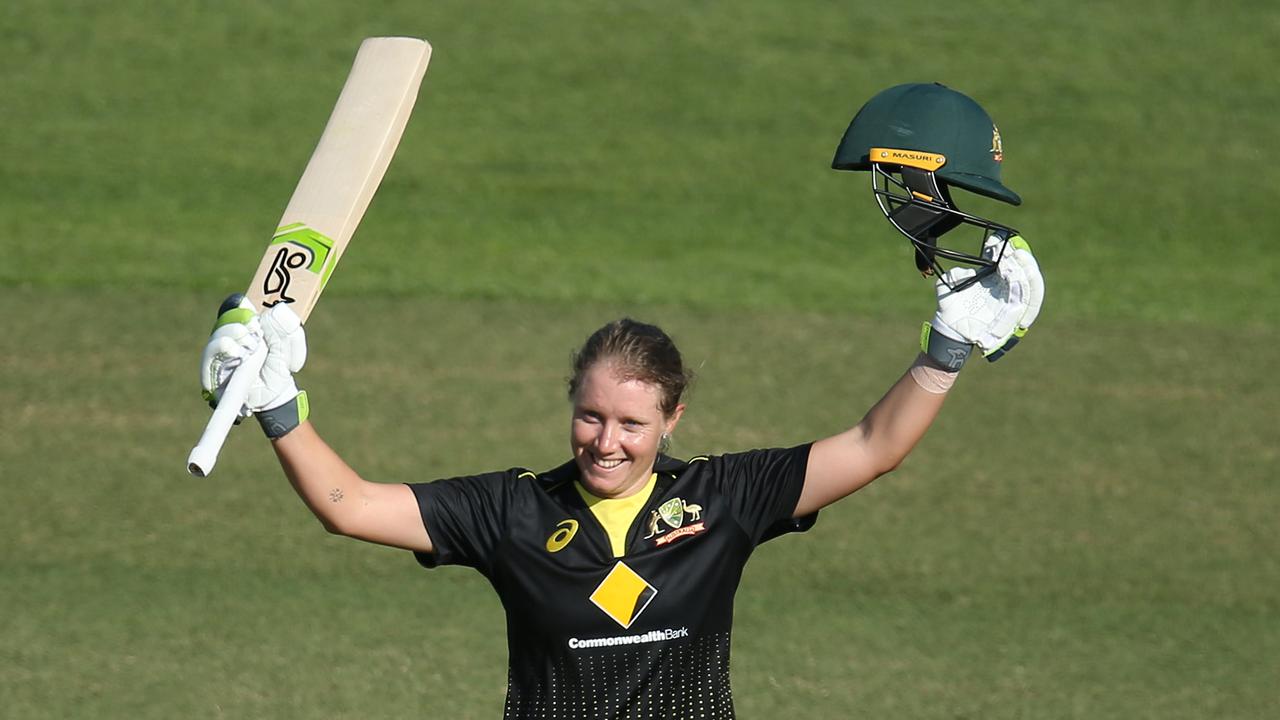 SYDNEY, AUSTRALIA - OCTOBER 02: Alyssa Healy of Australia celebrates scoring a century during game three of the Women's Twenty20 International Series between Australia and Sri Lanka at North Sydney Oval on October 02, 2019 in Sydney, Australia. (Photo by Jason McCawley/Getty Images)