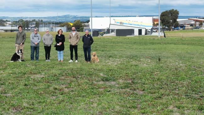 The land declared as surplus is located adjacent to the Golden Plains Soccer club off Mowbray Way. Local residents in opposition of the decision pictured from left: Ben Gibbs with Bella, Daryl Charlton, Jackie Charlton, Beverley Bond, Josh Trowell and Chris Balis with Mac. Picture: Mark Wilson