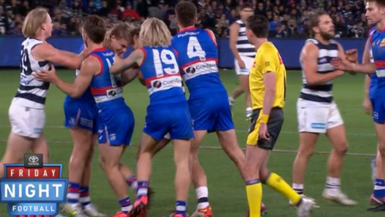 Bulldogs star Bailey Smith makes contact with Zach Tuohy’s face. Picture: Fox Footy