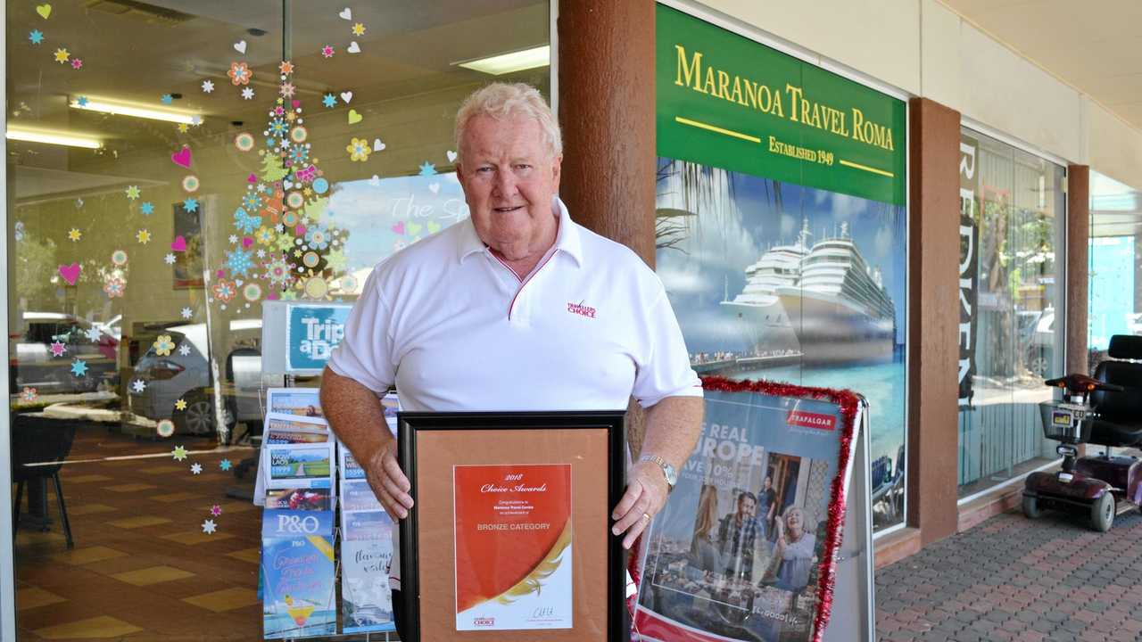 FLYING HIGH: Maranoa Travel owner Peter Flynn and his team have received the industry's Bronze Choice Award. Picture: Molly Hancock