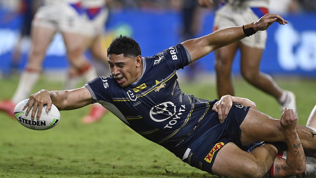 TJason Taumalolo of the Cowboys reaches out for the try line. Getty Images