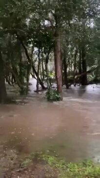 Water gushing on Stones Road at Woodbury