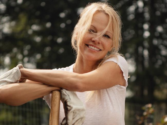 Pamela Anderson is not afraid to get dirty in her garden.