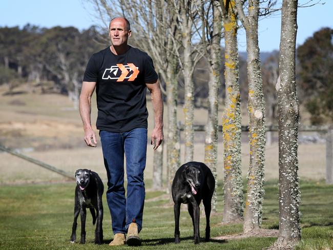 Tony Lockett at home on his farm with his dogs. Picture: Michael Klein