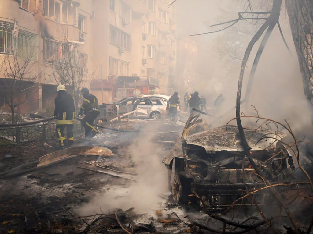 Ukrainian rescuers work at the site of a missile attack in Odessa. Kyiv says it carries out drone strikes in response to Russian bombings of its territory. Picture: AFP