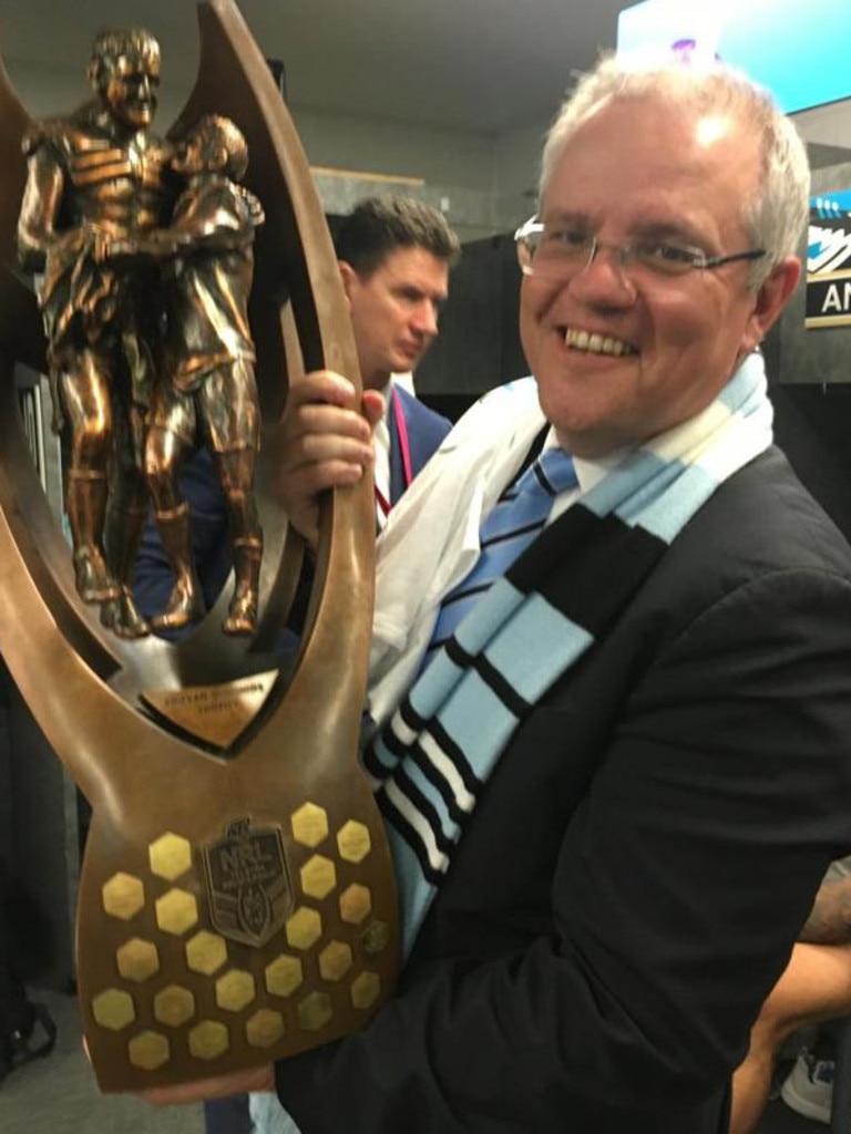 Scott Morrison with the Provan-Summons Trophy after Cronulla’s Grand Final win. Picture: Facebook